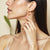 925 STERLING SILVER ENAMELED NET PEAR BACK TO BACK EARRINGS.